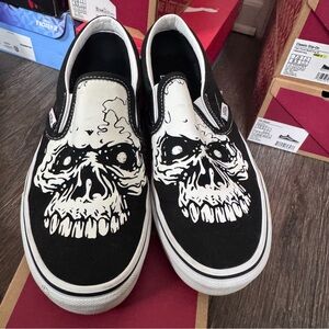 Vans Black and White Skull Slip-On Sneakers